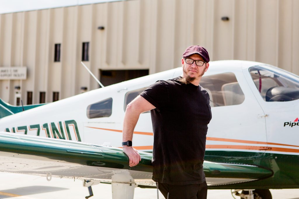 Josh Tuinder, real estate agent in Grand Forks, North Dakota, on the flight line at UND Aerospace